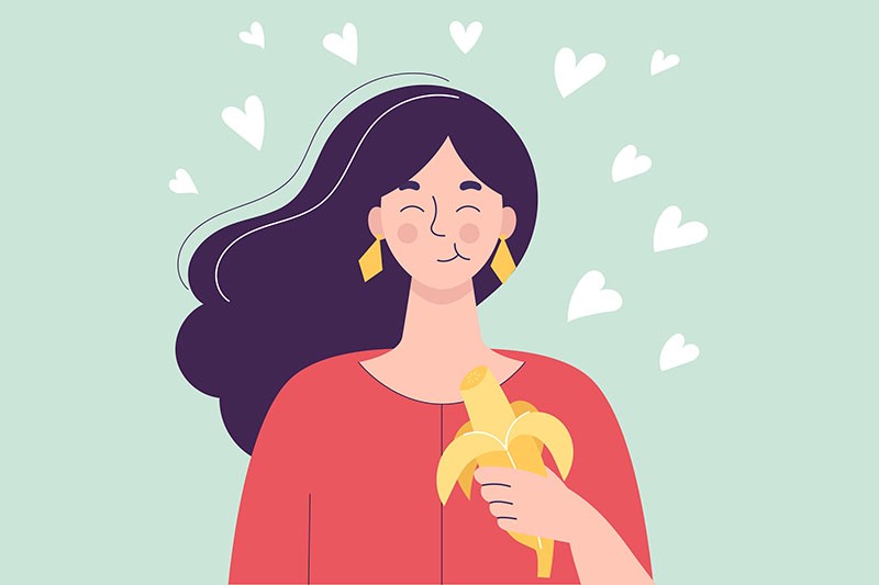 desenho de menina comendo uma banana
