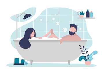 homem e mulher sentados em uma banheira